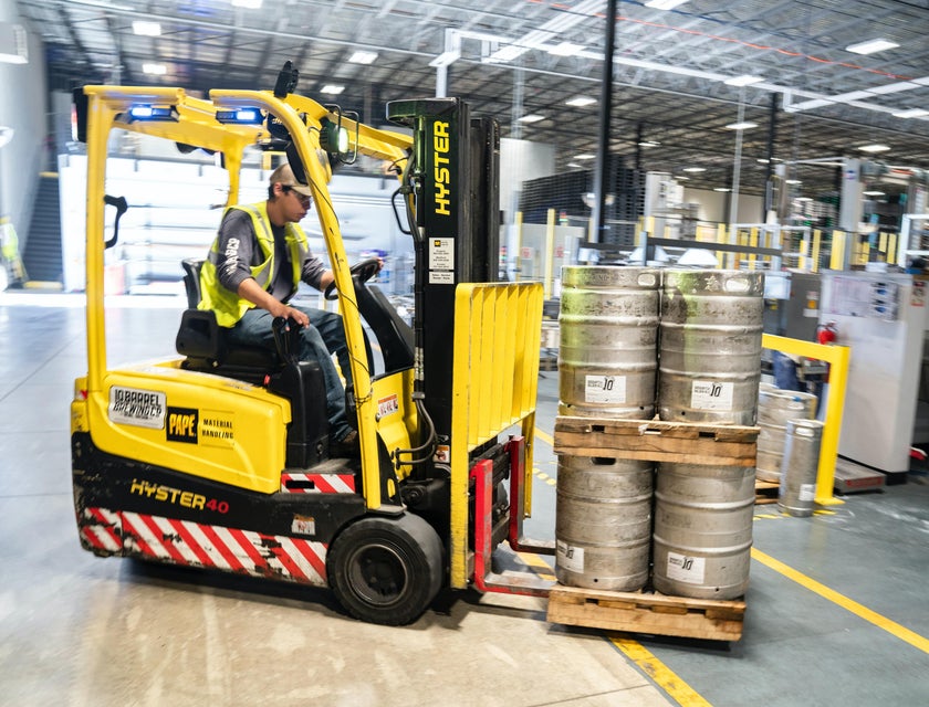 A Forklift Operator about to transport materials to a different location within the warehouse.
