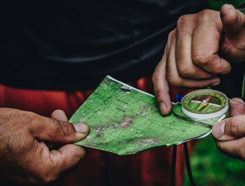 two men holding a map
