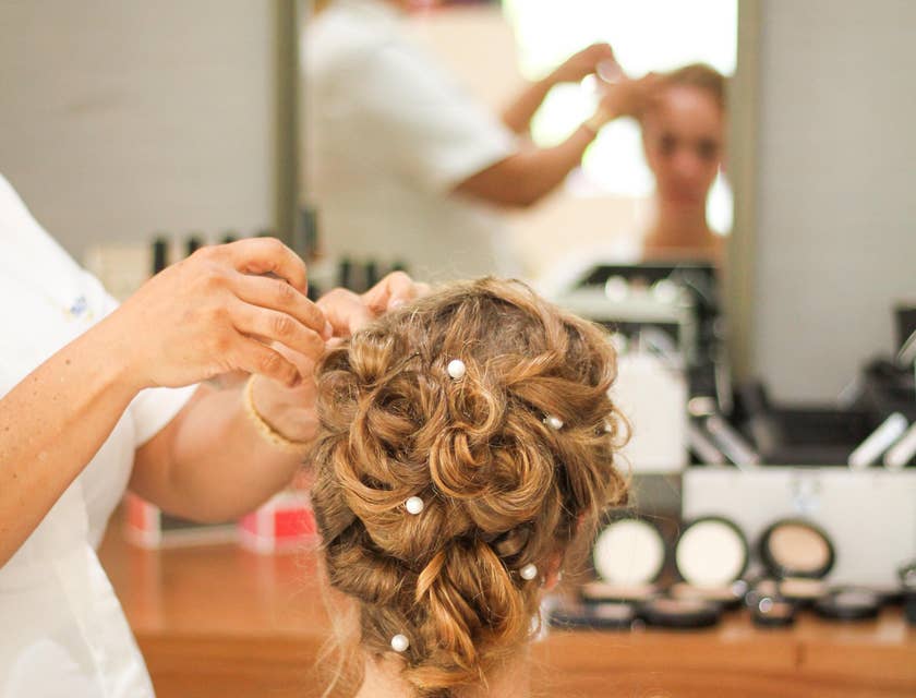 Hairdresser styling a client's hair