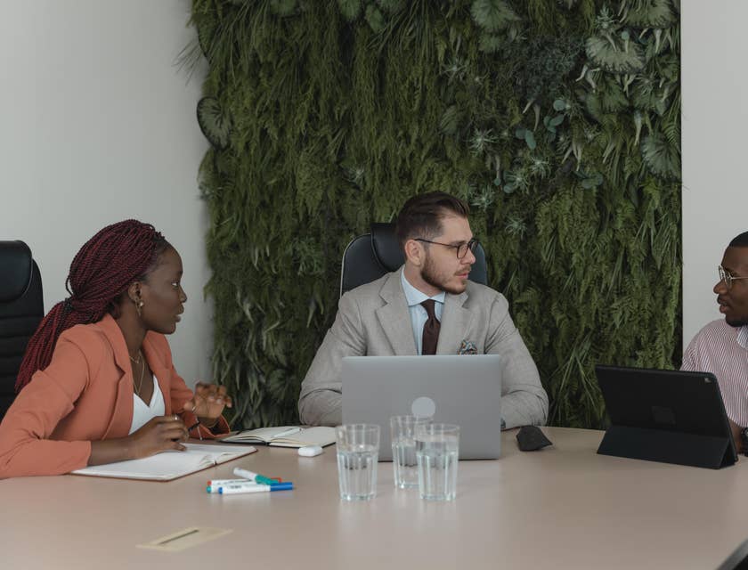 A Female Headhunter having a meeting with hiring managers.