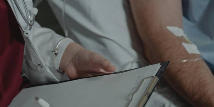 Hepatologist monitoring patients' recovery process.