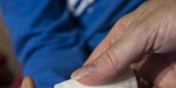 Home health nurse clean and re-dress wound.