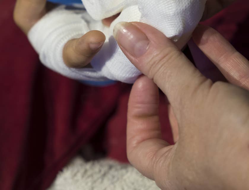 Home health nurse clean and re-dress wound.