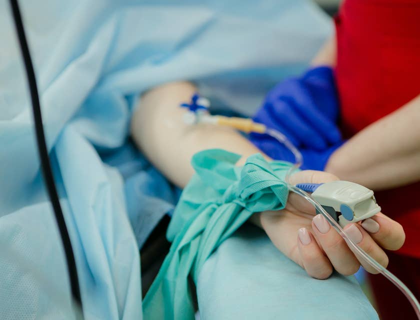 Hospital Sitter monitoring patients' vital signs.