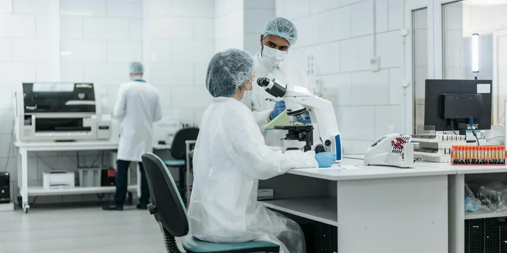 Medical technologists working in a laboratory.