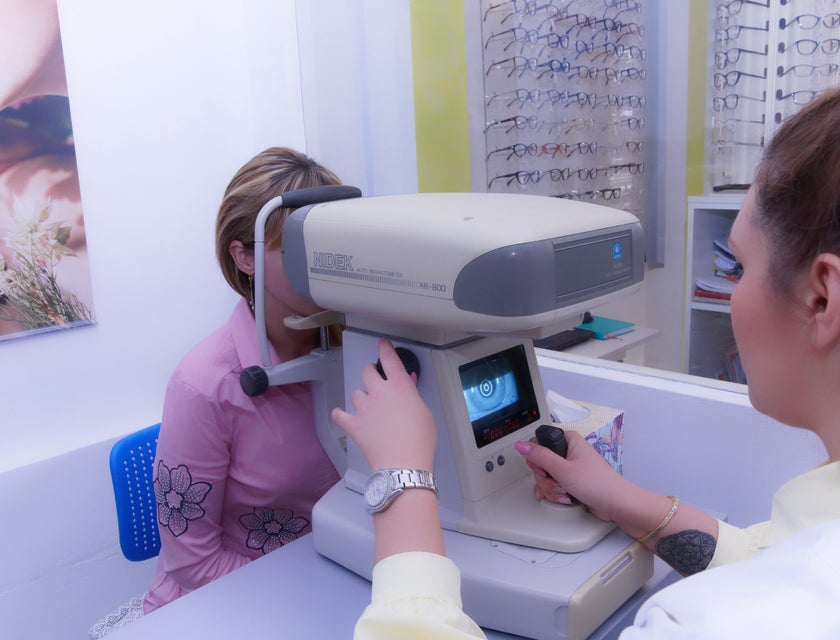 optometrist conducting eye exam