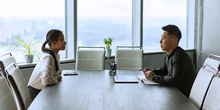 An HR advisor discussing the job with an employee.