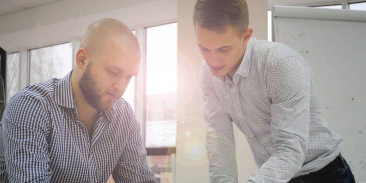 An HR Generalist assisting an employee in training.