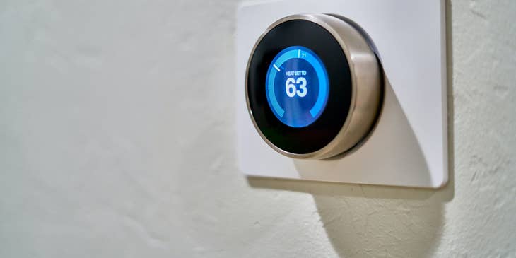 thermostat installed by an HVAC Helper to control heating and air-conditioning