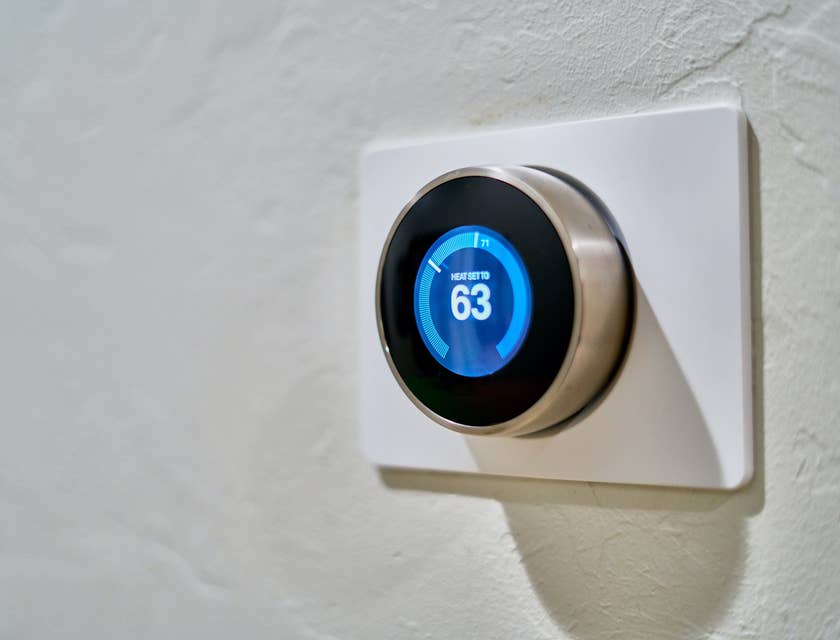 thermostat installed by an HVAC Helper to control heating and air-conditioning