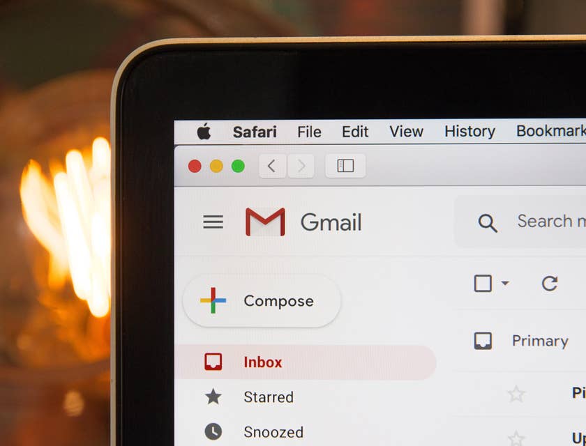 An email inbox on a laptop.