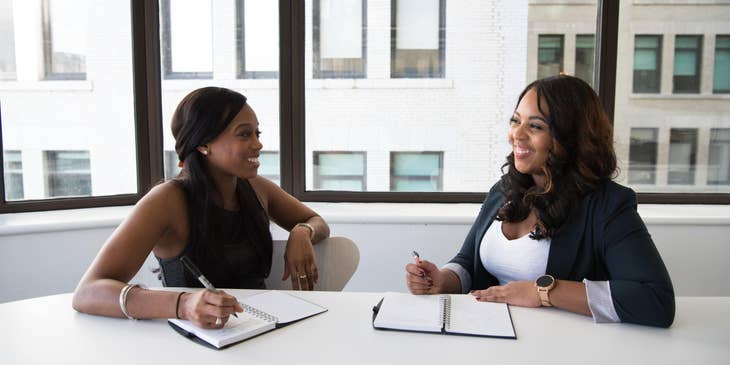 Woman with interview questions in a job interview.