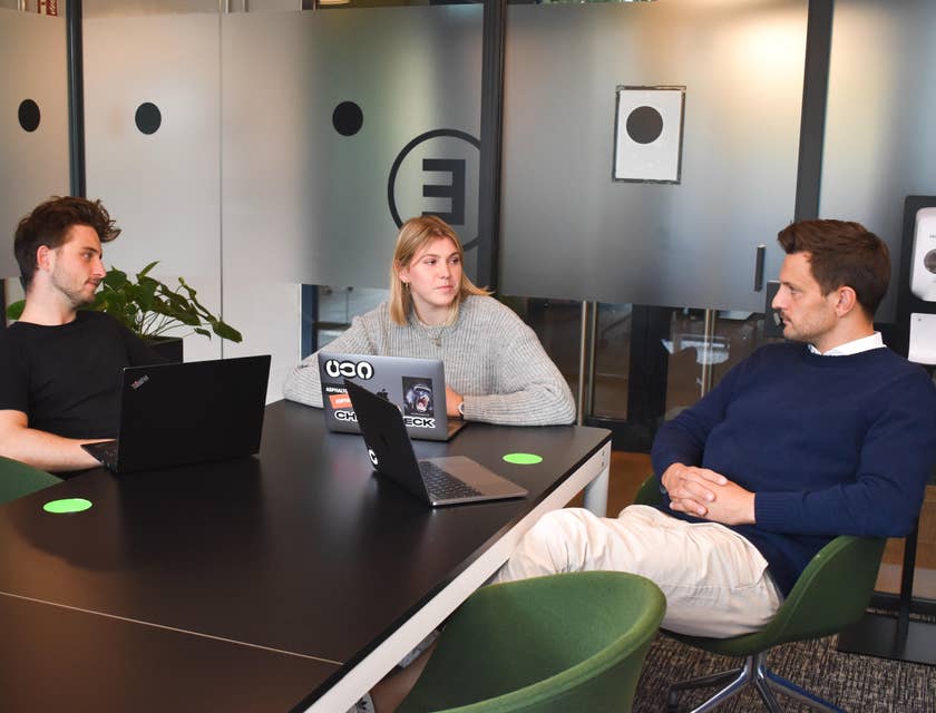 a team of Java Architects deliberating on a new design system they will be working on
