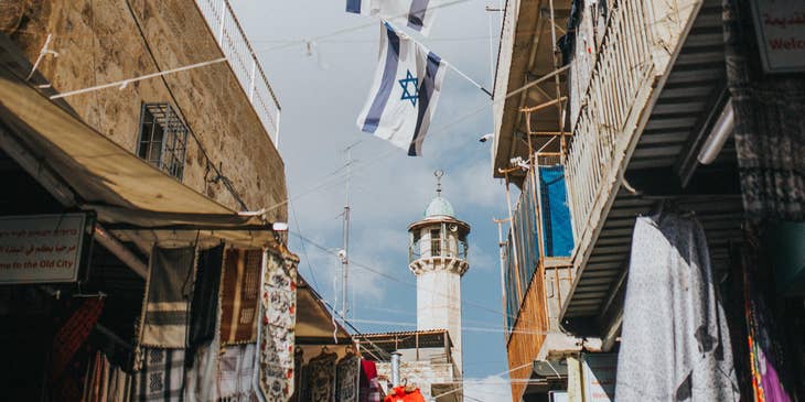 Israeli flags lining a street.