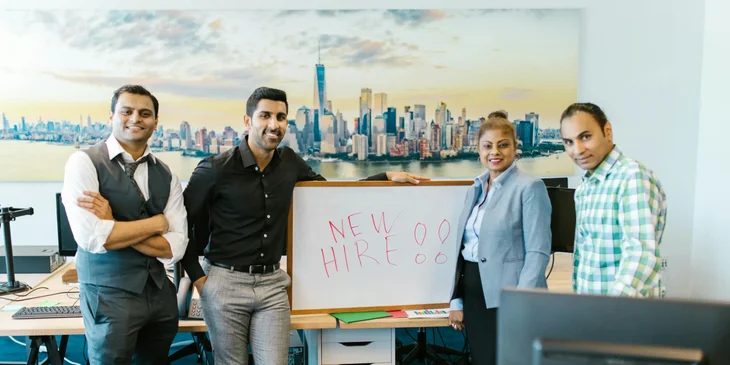 A group of new employees at a job orientation.