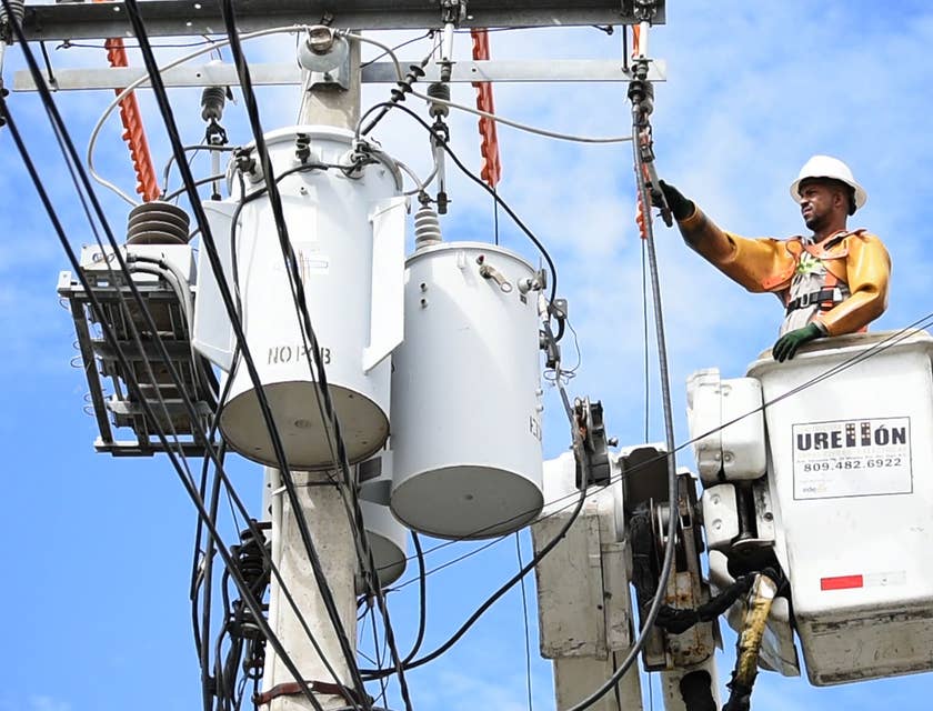 Journeyman Lineman working on power lines