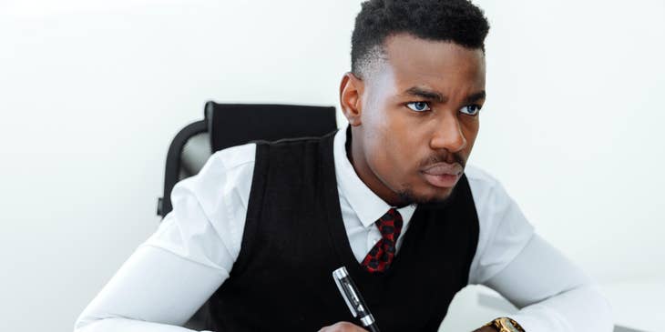 A legal analyst conducting research and gathering legal informations from his computer.