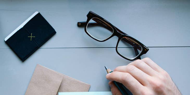 A man composing a business letter.