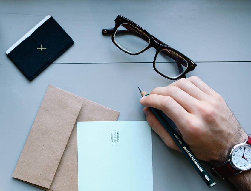 A man composing a business letter.