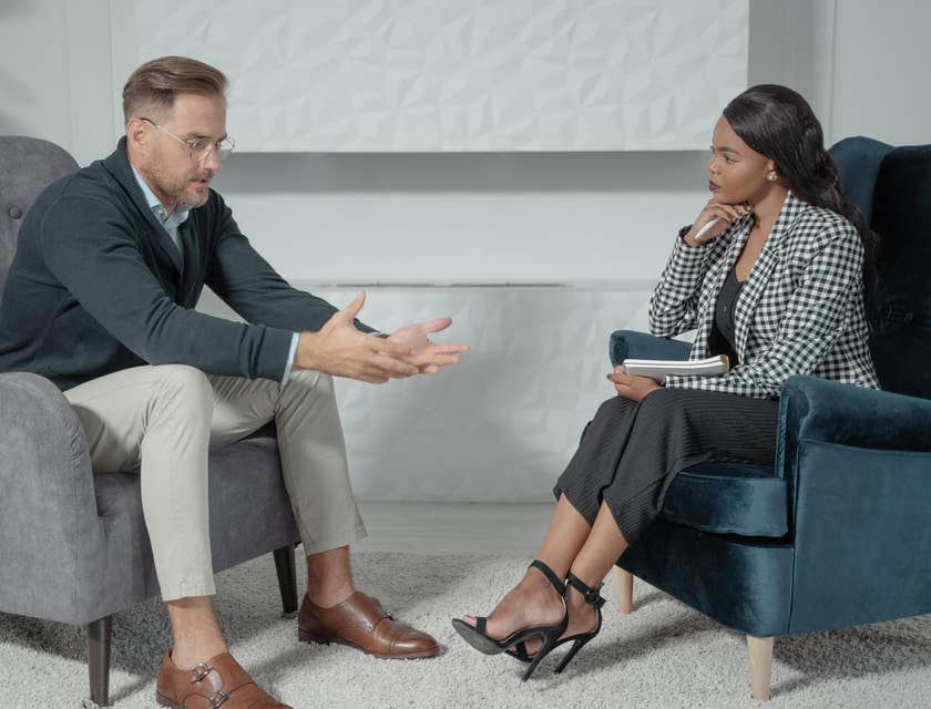 Licensed professional counselor listening to clients concern.