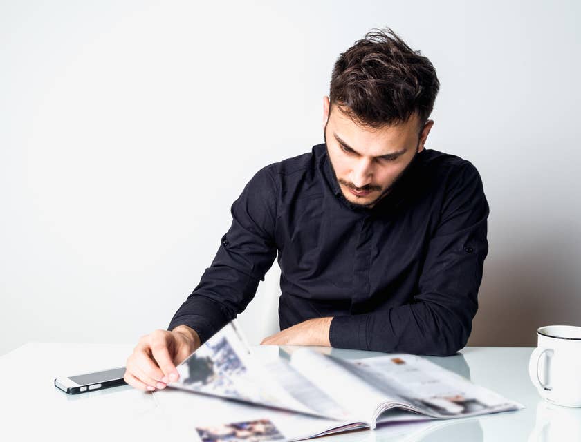 Magazine Editor reviewing the final product before production