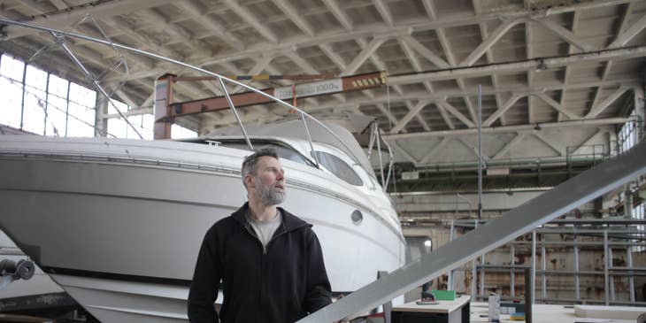 Marine Service Technician repairing a boat