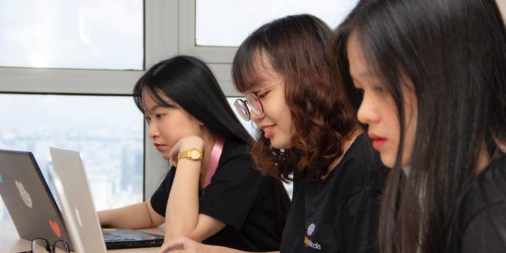 a group of Marketing Associates doing their day-to-day administrative tasks