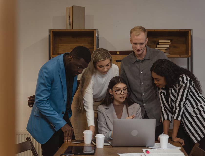 Marketing executive gathering her teammates to provide ideas for their project