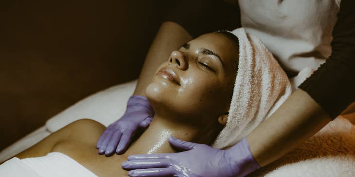 Massage therapist providing massage services.