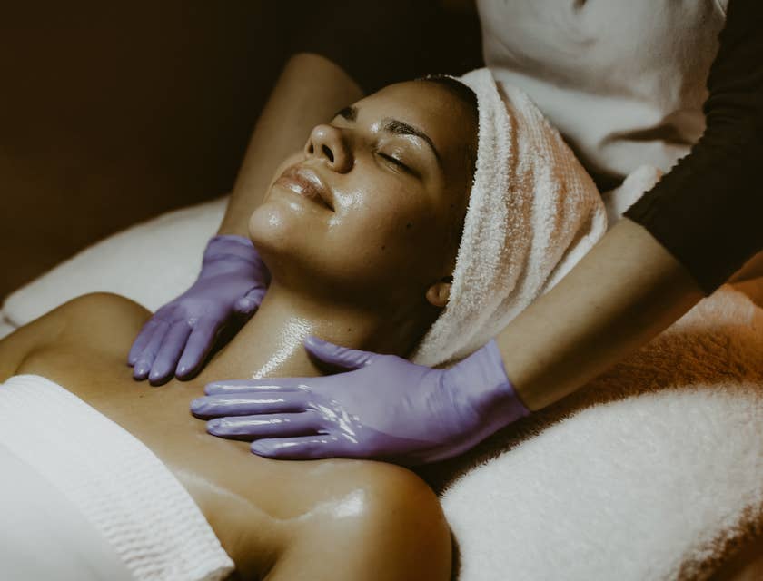 Massage therapist providing massage services.