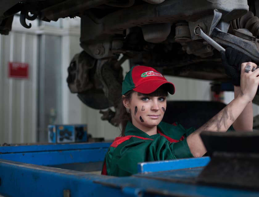 Mechanic apprentice holding a steel wrench