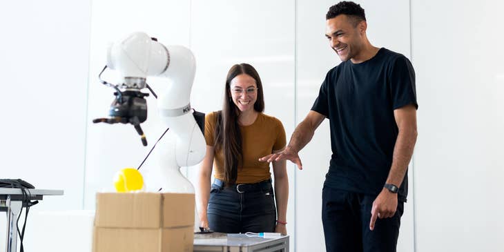 Mechanical engineers testing out a robotic equipment for medical use