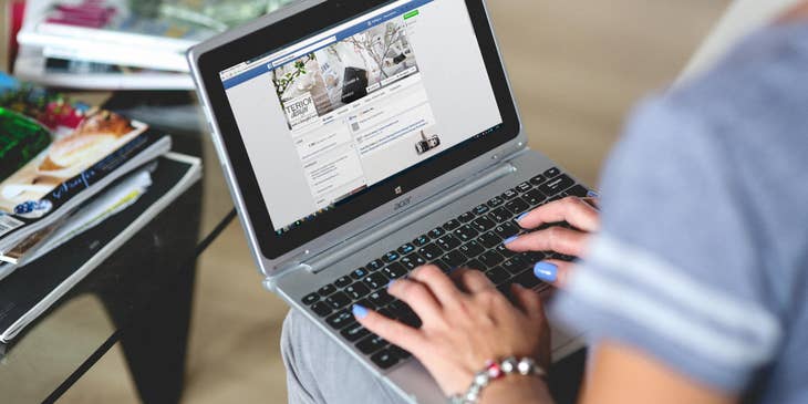 Media coordinator setting up and propagating social media page for an advertising campaign