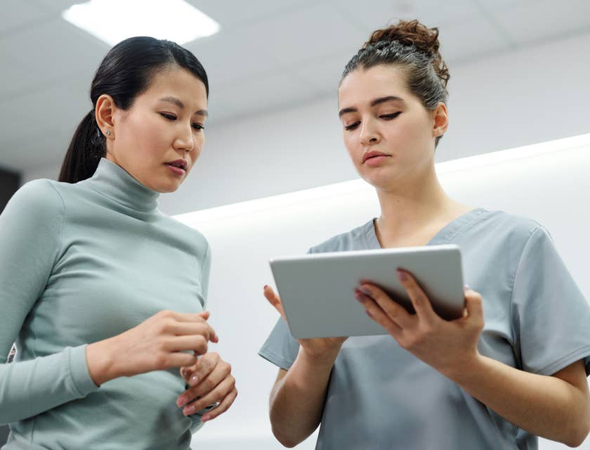 Medical office specialist taking down a patient's information