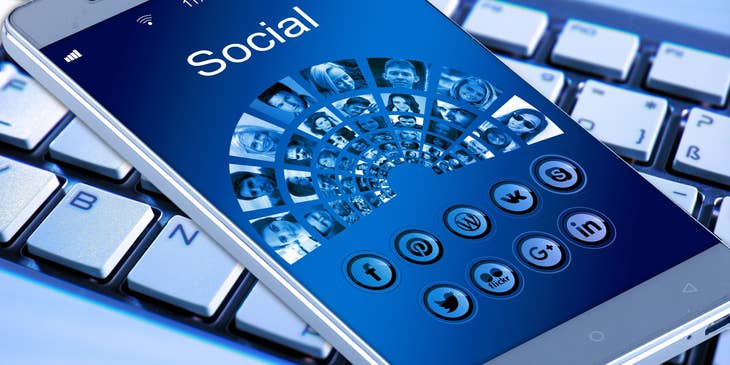 A cell phone with the word 'social' on it.