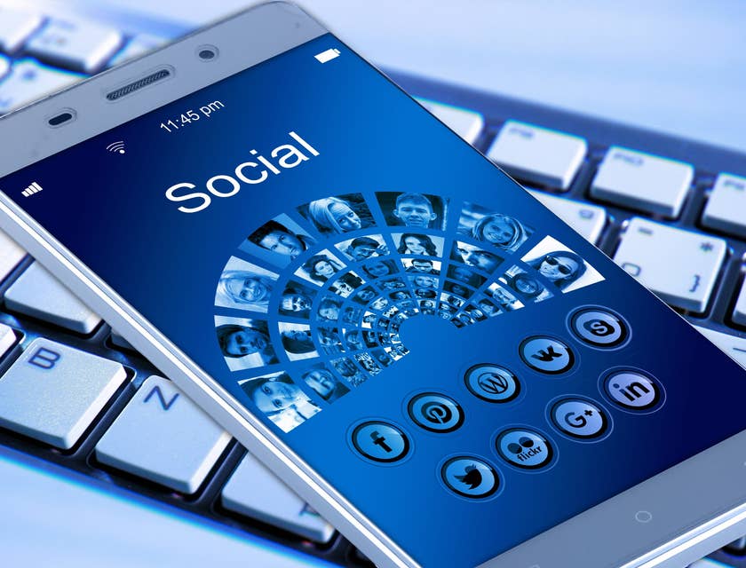 A cell phone with the word 'social' on it.