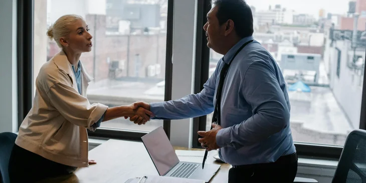 A national account manager meeting with a client.