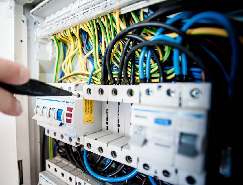 Networking specialist repairing a part of the company's server.