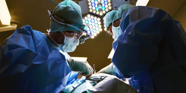 A neurosurgeon performing an emergency surgery.