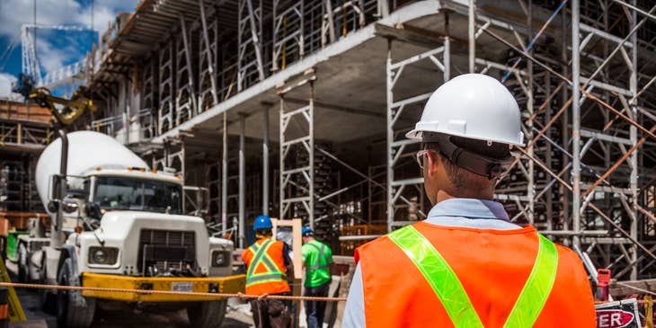 Occupational health nurse inspecting the worksite to maintain health and safety standards.