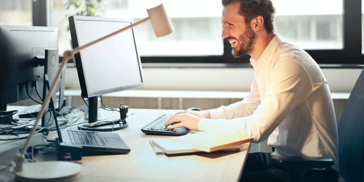 Office assistant working on a desktop