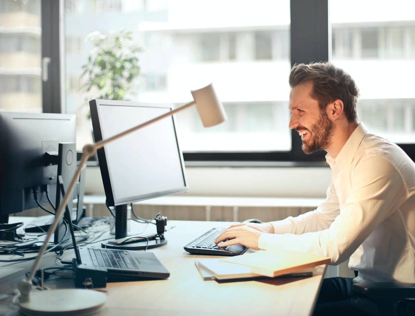 Office assistant working on a desktop