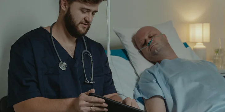 An oncologist discussing treatment options with a patient.