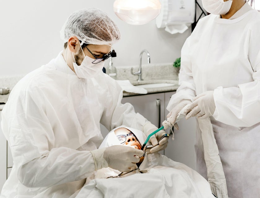 Oral surgeon treating infections of the oral cavity.