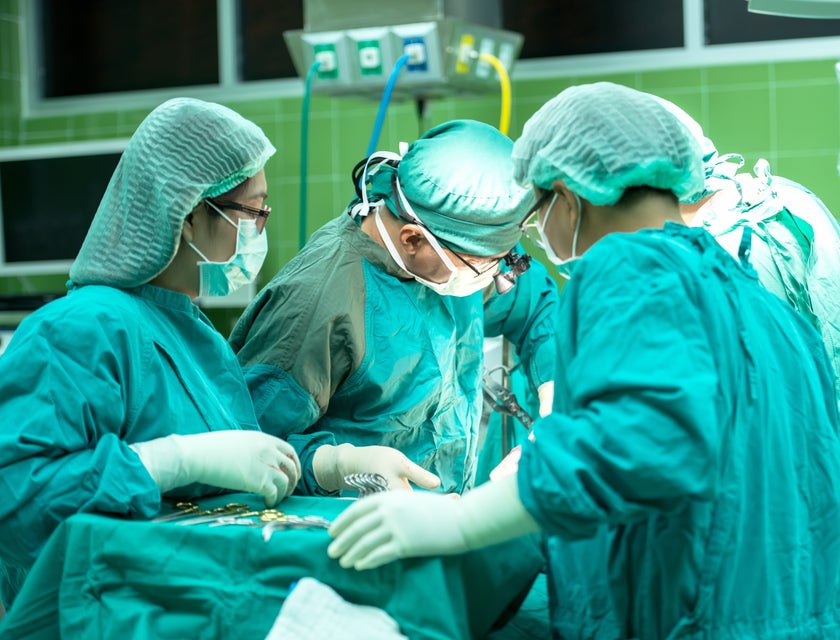 Orthopedic surgeon performing a surgical procedure.