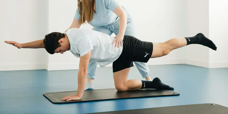 An osteopathic doctor doing a session with a patient.