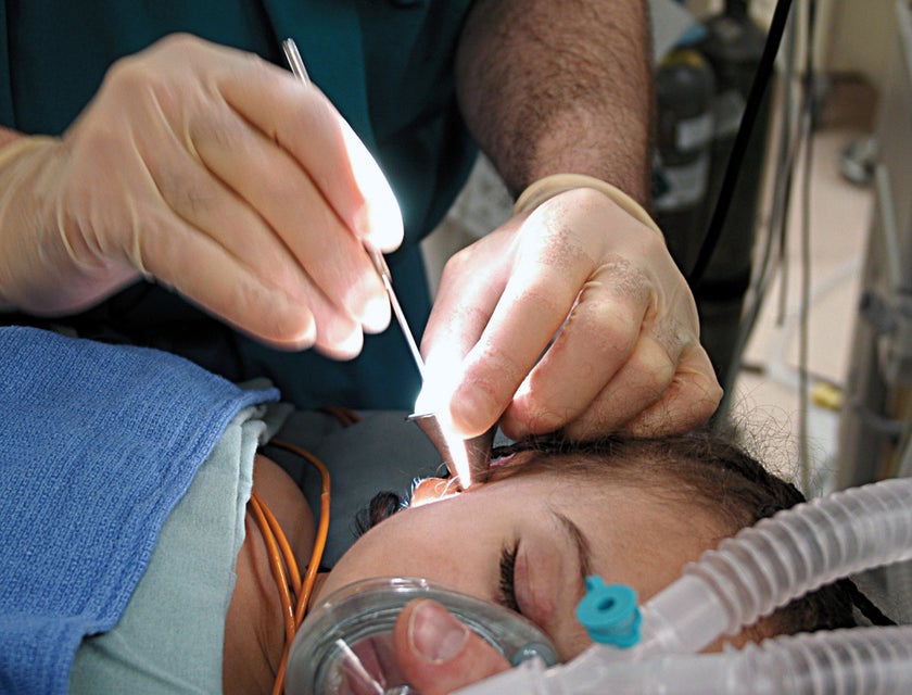 Otolaryngologist treating conditions of the ears.