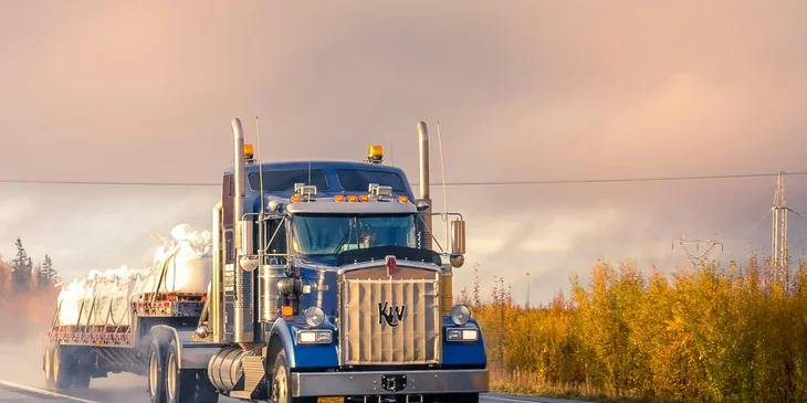 An OTR driver on the road transporting chemicals.
