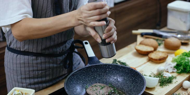 Personal chef preparing a meal.