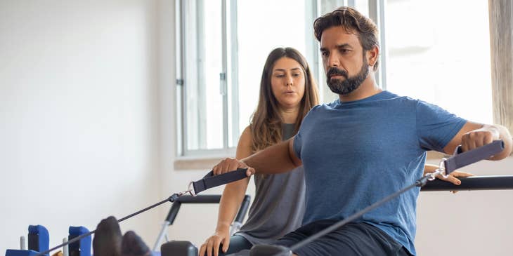 A man performing his physical therapy exercises.